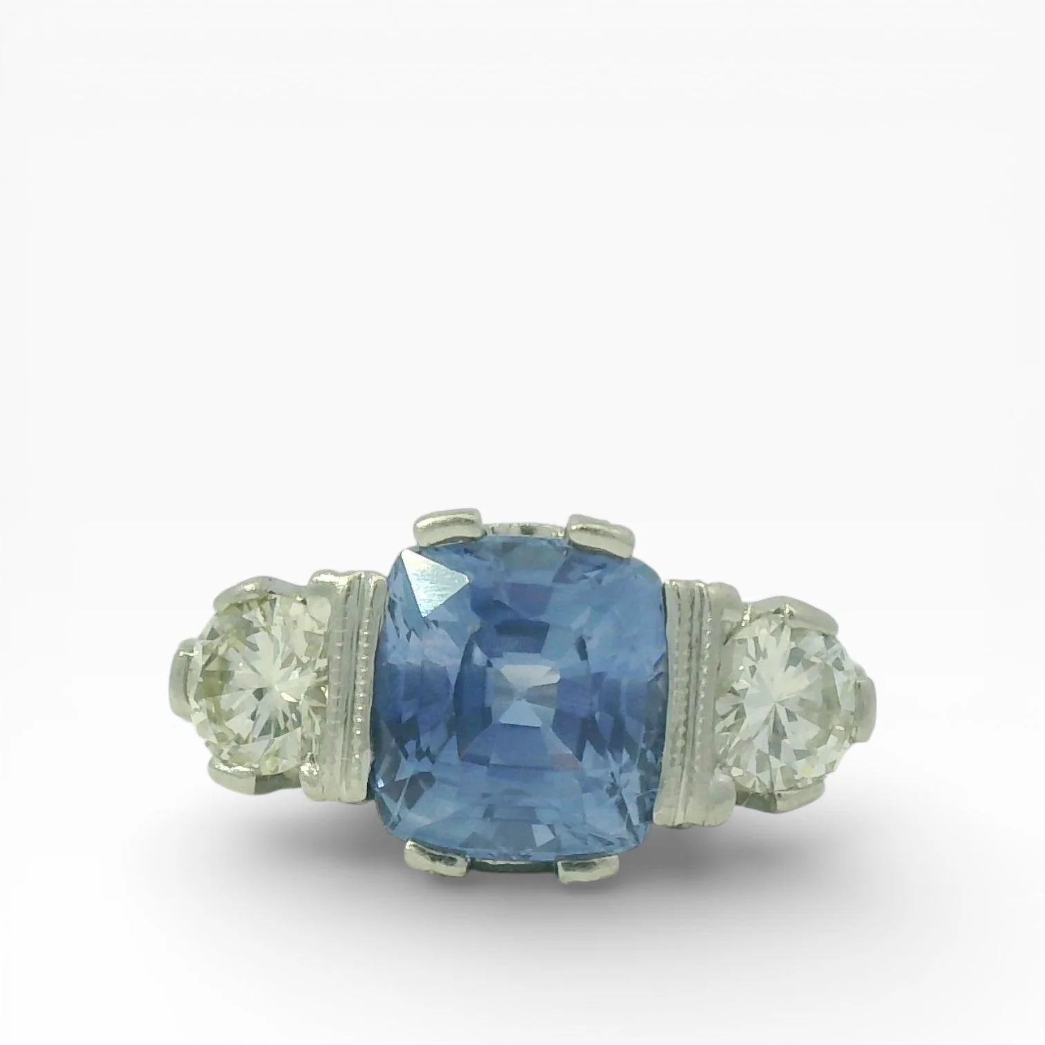 Estate Platinum Three-Stone Sapphire & Diamond Ring